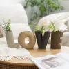 A colorful striped letter vase set in the shape of "LOVE" for home decoration details Picture